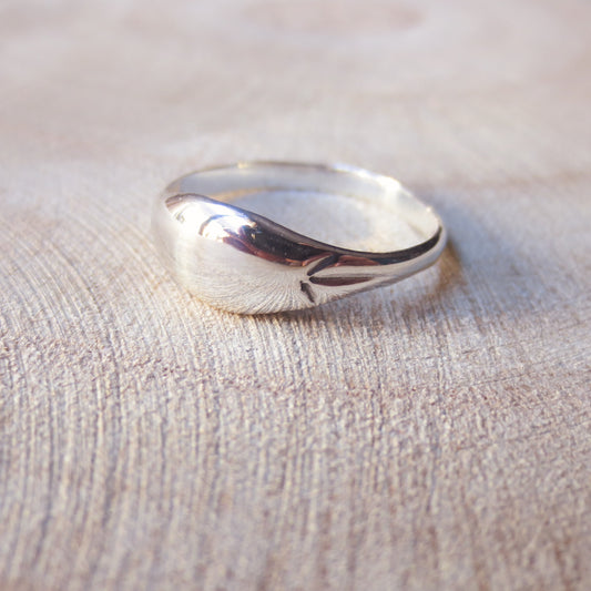 Reunite Signet Ring | smooth low dome signet ring with starburst engravings